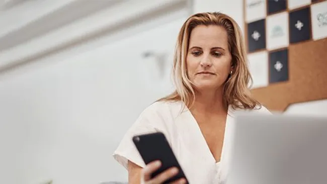 A woman checking her phone