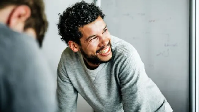 A man grinning