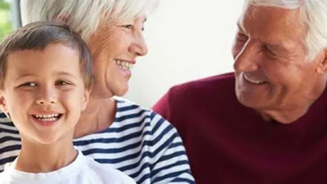 Two grandparents with grandchild
