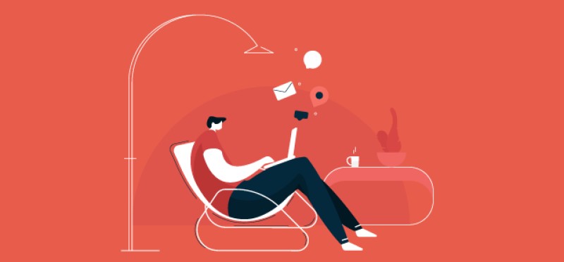 A man working while on the couch