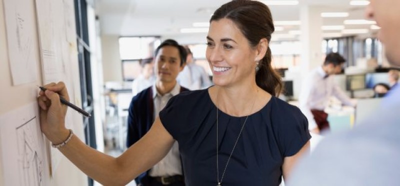 A woman discussing plans