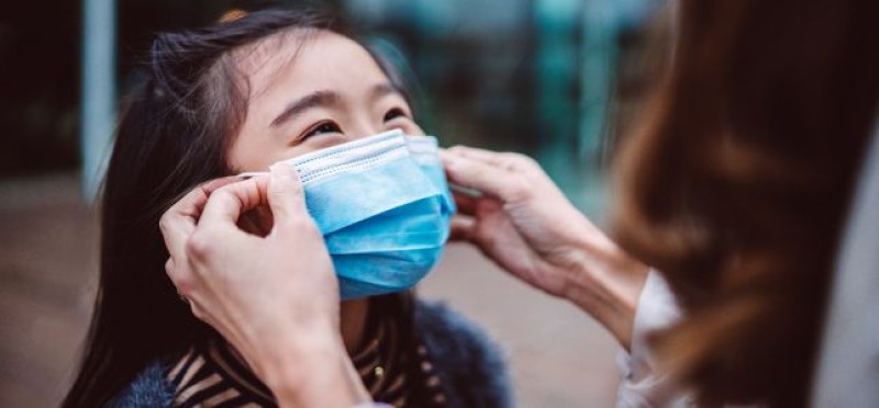 A child with a facemask