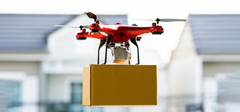 Drone carrying a parcel