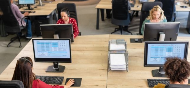 Employees at their workstations