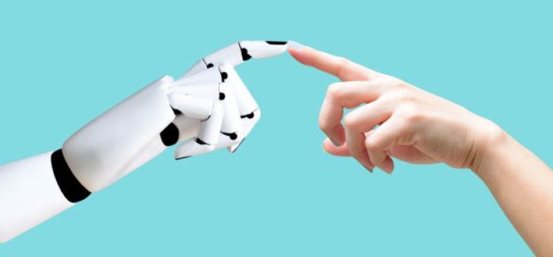 Robot and human hands 