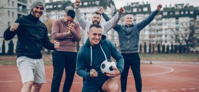 A team of men winning
