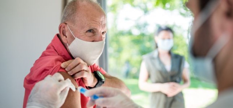 A senior citizen getting vaccinated