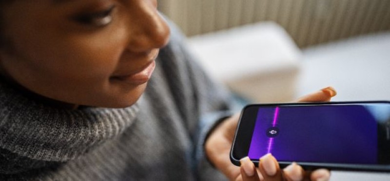 A woman recording a voice message