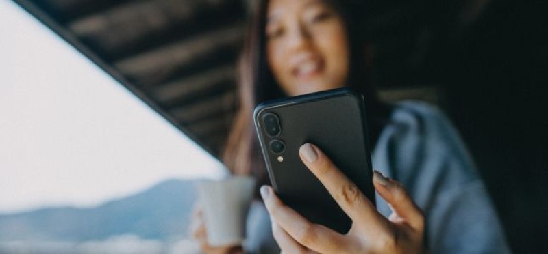 A woman checking her phone